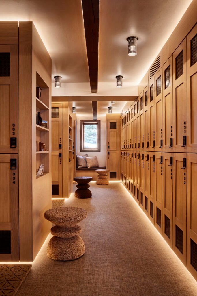 Four Seasons Vail Chalet ski locker room with wood lockers and window seating