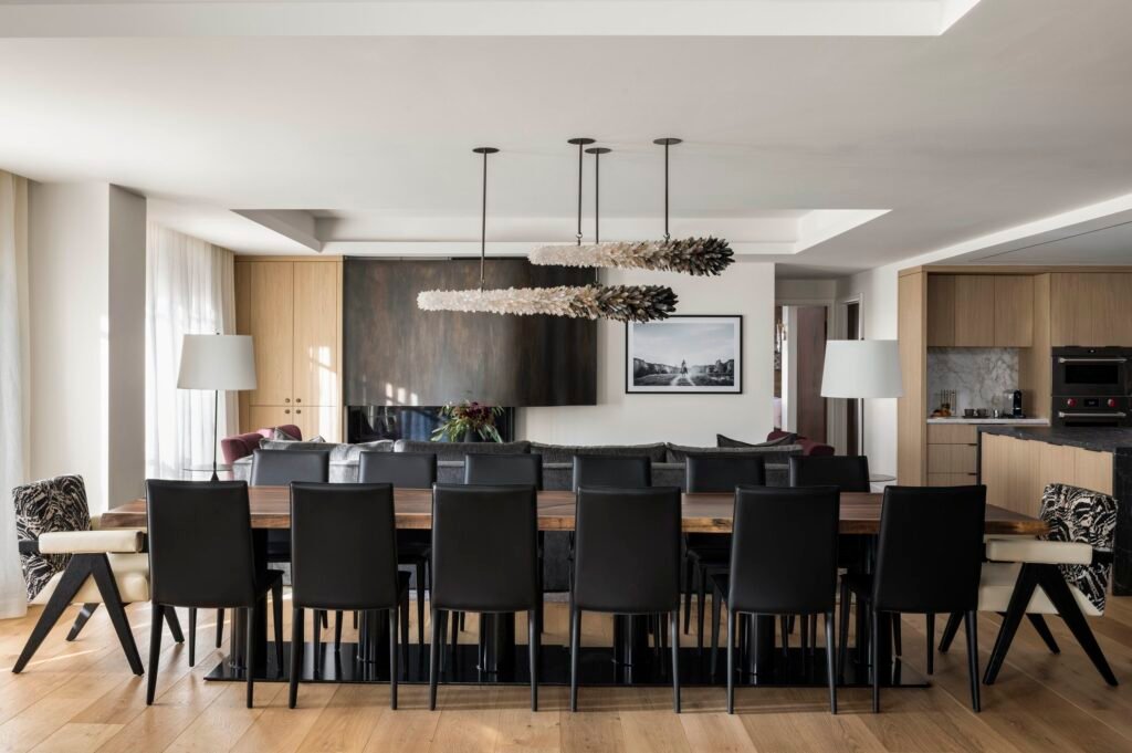 Completed Paris penthouse dining room at Four Seasons Vail with custom lighting and table