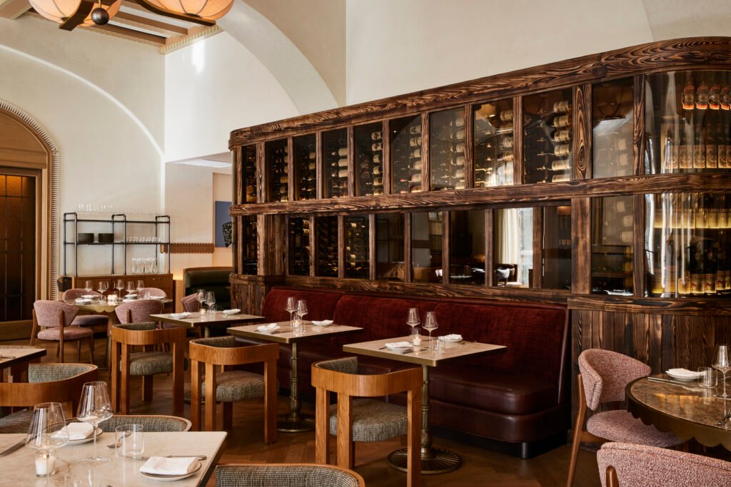Tavernetta Vail 3 Completed Tavernetta Vail dining room with custom wine cabinetry and banquette seating
